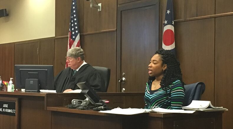 Dunbar High School athletic director Quiona Boffman testifies Tuesday, March 6, in the Dayton school board’s hearing against the Ohio High School Athletic Association. JEREMY P. KELLEY / STAFF