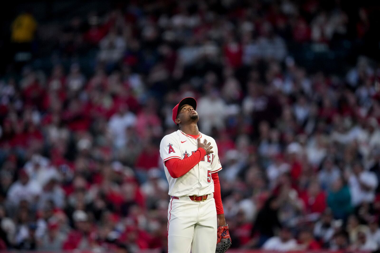 Los Angeles Angels starting pitcher Jose Soriano reacts after finishing the first inning of a baseball game against the Cleveland Guardians in Anaheim, Calif., Friday, April 4, 2025. (AP Photo/Eric Thayer)
