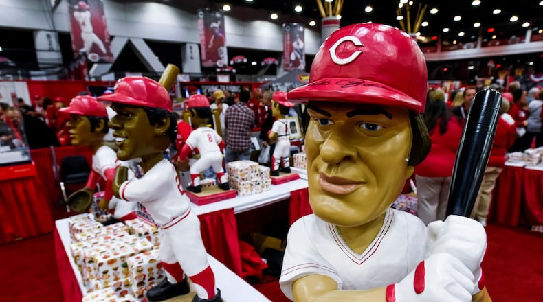 The bobblehead booth was decorated with oversized bobbleheads of former Reds players, like this one of Pete Rose, during RedsFest Friday, Dec 2, 2016, at Duke Energy Convention Center in Cincinnati. NICK GRAHAM/STAFF