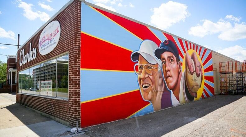 The new Hamilton mural featuring Cincinnati Reds legend, Joe Nuxhall, painted on the side of Clark’s Sporting Goods on Hamilton s west side. GREG LYNCH / STAFF Staff Writer
