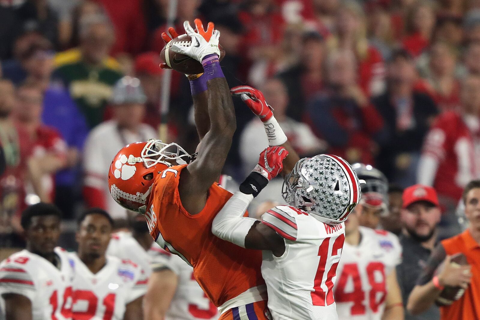 GLENDALE, AZ - DECEMBER 31: Mike Williams #7 of the Clemson Tigers attempts to make a reception against Denzel Ward #12 of the Ohio State Buckeyes during the 2016 PlayStation Fiesta Bowl at University of Phoenix Stadium on December 31, 2016 in Glendale, Arizona. (Photo by Jamie Squire/Getty Images)