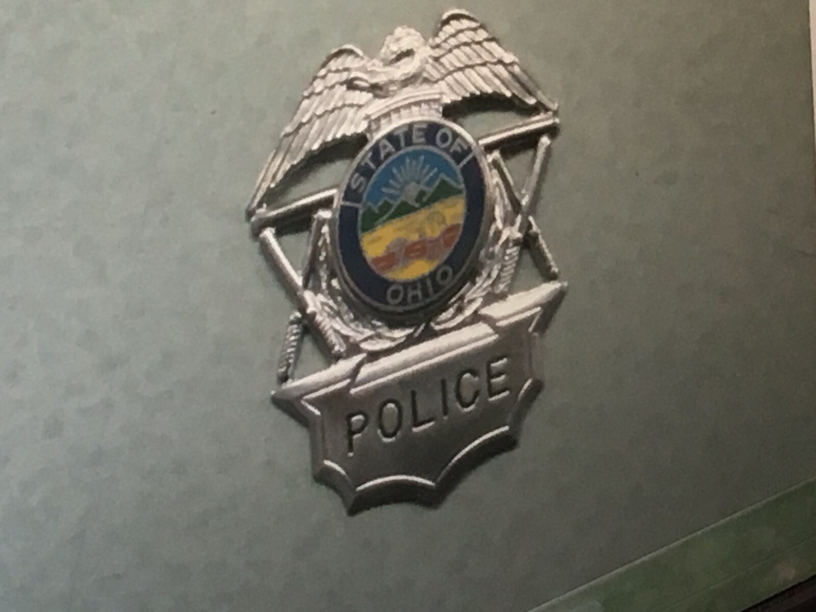 Investigators said this was the badge Christopher Boehmer showed to multiple patrons of Caddy's Tap House in Beavercreek.