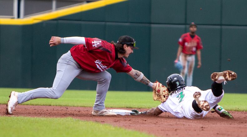 Dayton's Victor Acosta steals second base in the first inning ahead of the tag by Great Lakes shortstop Jordan Thompson. Jeff Gilbert/CONTRIBUTED