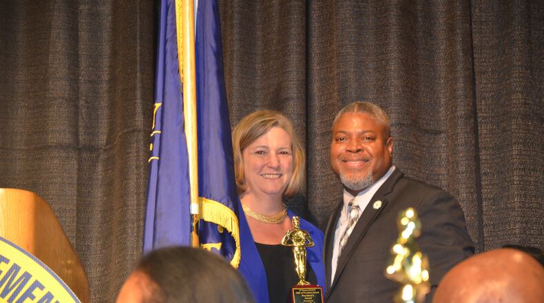 Former Dayton Mayor Nan Whaley receives the 2023 Dayton NAACP President's Award of Freedom from organization President Derrick Foward.