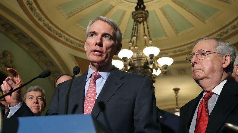 WASHINGTON, DC - NOVEMBER 14: Sen. Rob Portman (R-OH) speaks to reporters about the Senate Republican tax bill, after attending the Senate GOP policy luncheon, at U.S. Capitol on Nov. 14, 2017, in Washington, D.C. (Photo by Mark Wilson/Getty Images)