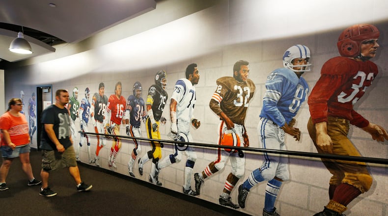 CANTON, OH - AUGUST 03: Fans visit the Pro Football Hall of Fame prior to the NFL season's inaugural preseason game between the Dallas Cowboys and Arizona Cardinals at Tom Benson Hall of Fame Stadium on August 3, 2017 in Canton, Ohio. (Photo by Joe Robbins/Getty Images)
