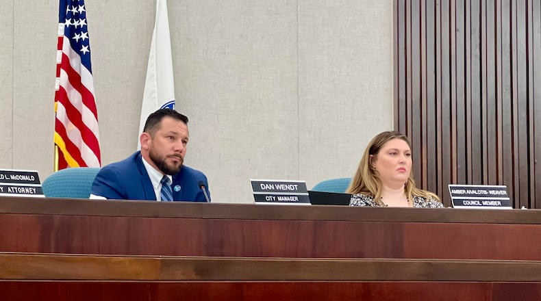 Vandalia City Manager Dan Wendt, left, listens as residents address City Council as part of a public comment segment during a special meeting held Wednesday, June 5, 2024. AIMEE HANCOCK/STAFF