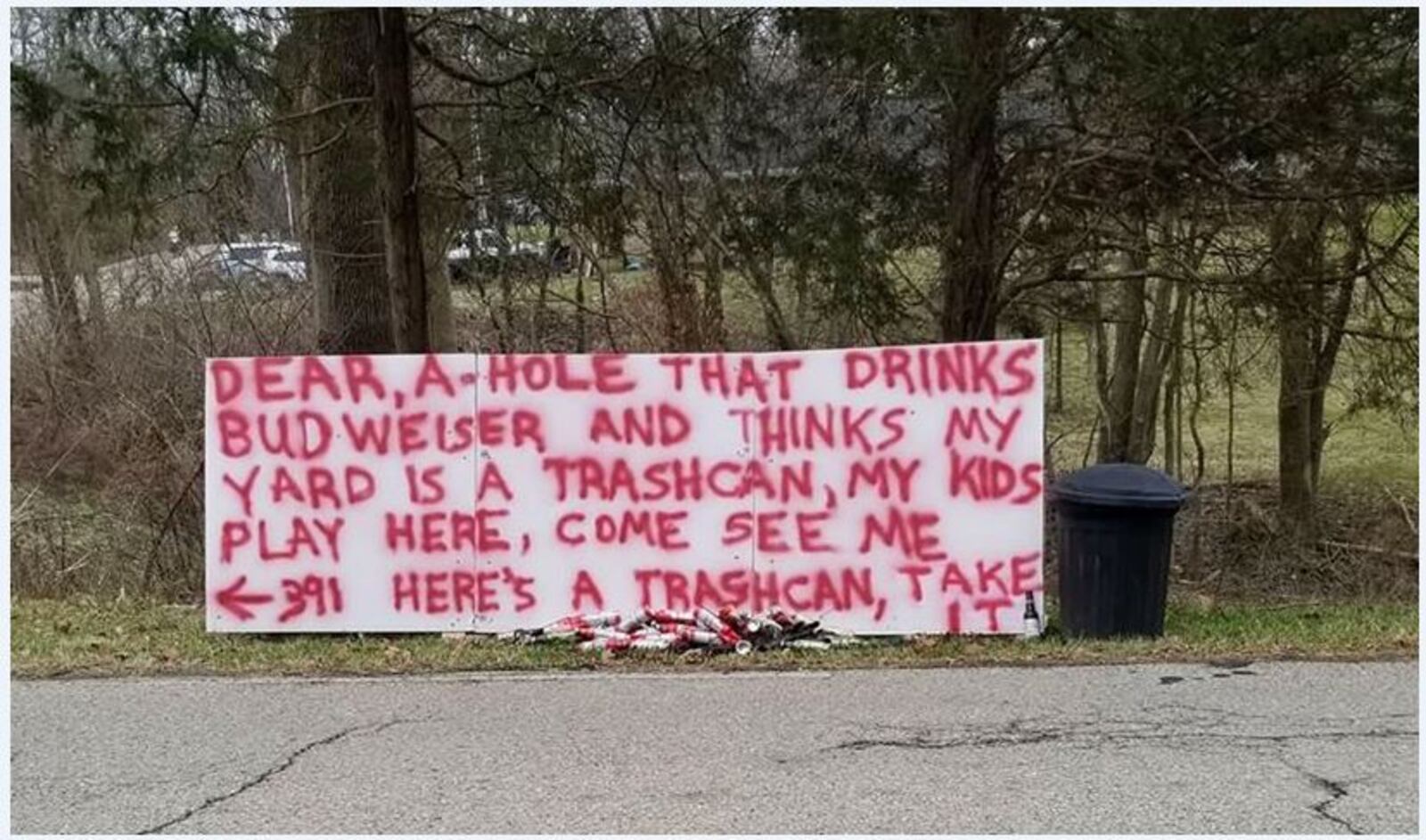 Jim Vantine, of Beavercreek, put up this sign to get whoever is chucking beer cans and bottles onto his property to cease and desist immediately. (Courtesy/IWitness 7 viewer)