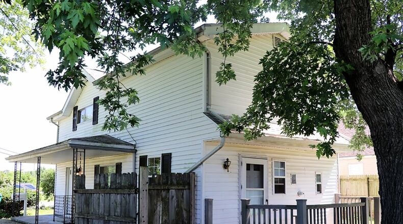 A door off the mud room opens to the composite deck and private back yard. The property has a garden shed with electric service and attached lean-to. The driveway extends into the back yard, allowing for additional off-street parking.