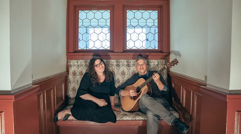 Tesia Mallory (left) and Matt Shetler of local folk duo the Nautical Theme, performing Yellow Cab Tavern in Dayton on Thursday, June 29, recorded the new digital EP, “Get Somewhere,” with Seth Canan and Chris Stewart at Trojan City Studios in Troy.