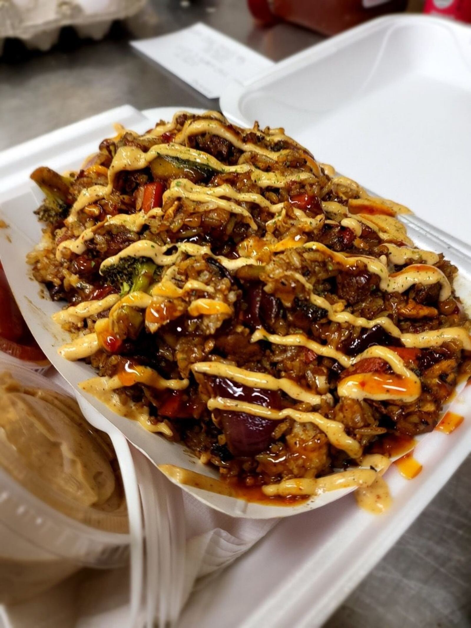 The Munchin’ Buddha, located at 100 N. James H. McGee Blvd., offers buddha (hibachi) bowls, street tacos, burgers, loaded fries and much more (CONTRIBUTED PHOTO).