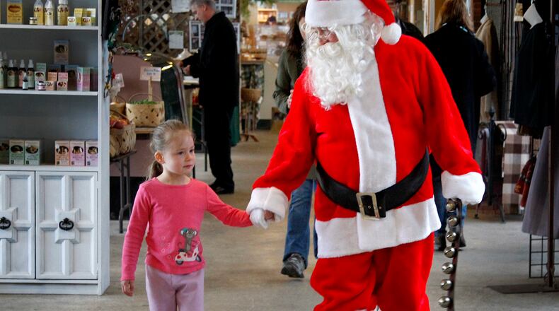Santa wants letters and questions from Dayton children to answer virtually on the 2nd Street Market Facebook page. LISA POWELL / STAFF PHOTO