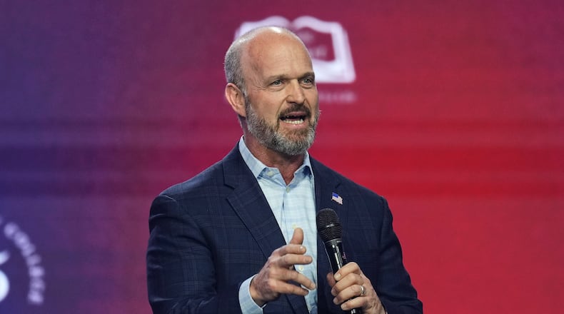 Kevin Roberts, president of The Heritage Foundation, speaks during Turning Point USA's AmericaFest 2025, Friday, Dec. 19, 2025, in Phoenix. (AP Photo/Ross D. Franklin)