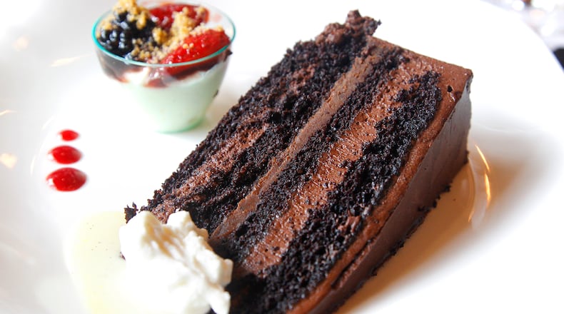 Cooperâs Hawk Winery & Restaurant, located in the Cornerstone of Centerville, opens Monday, Aug. 26. On the dessert menu is Cooper's Hawk chocolate cake made with valrhona chocolate, hazelnut ganache and vanilla ice cream. They also have a lemon ice wine cheesecake made with macerated berries and toasted graham cracker. LISA POWELL / STAFF