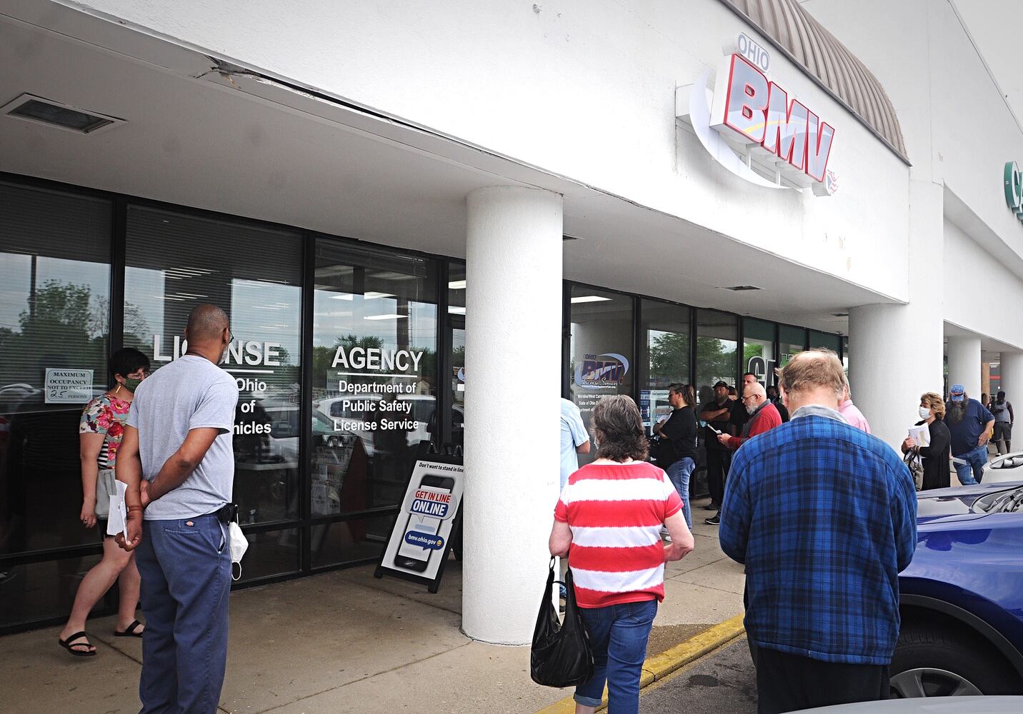 PHOTOS: Long lines as state BMV offices reopen after coronavirus shutdowns