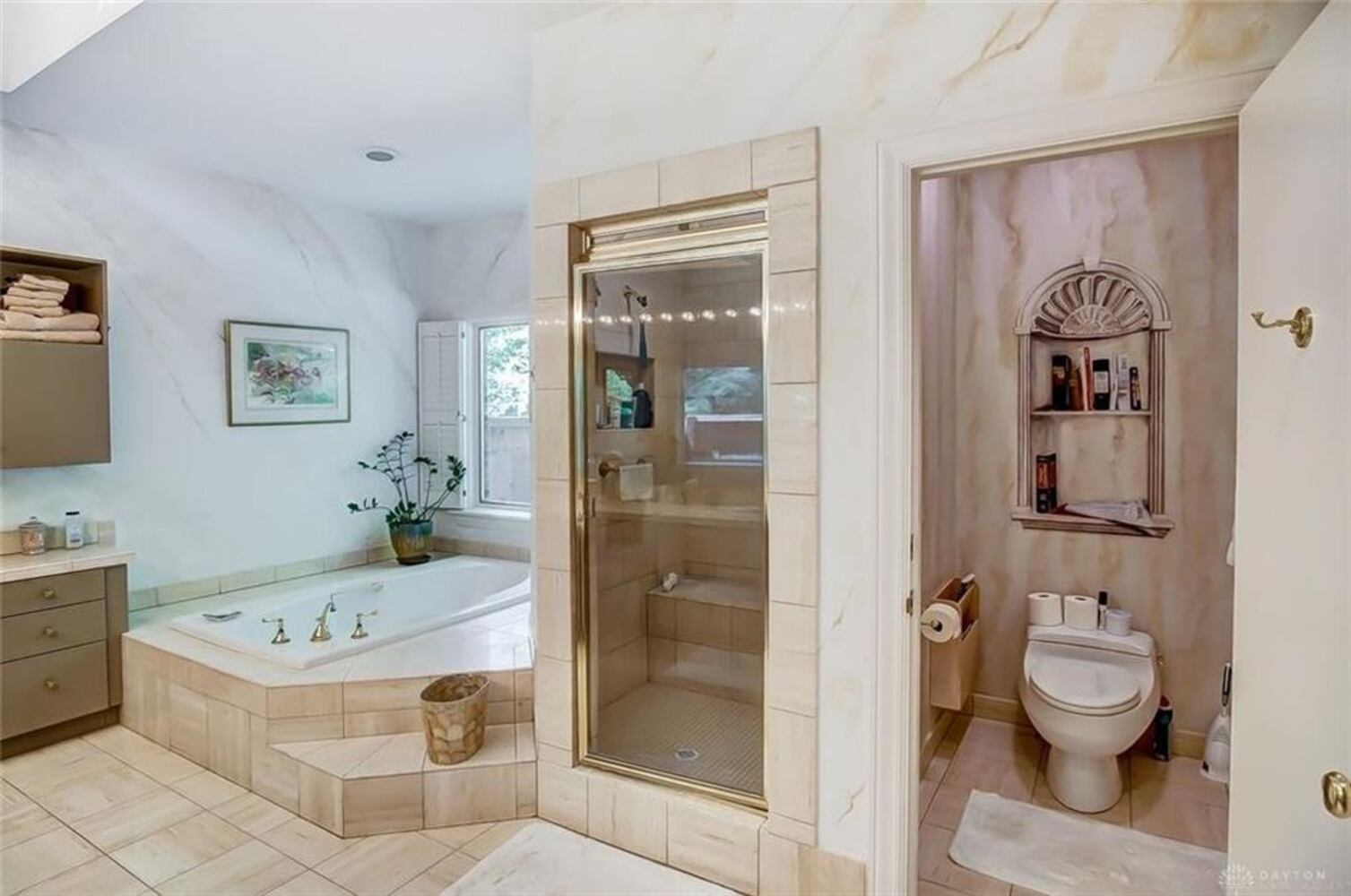 PHOTOS: Luxury Kettering home listed has pool, amazing closets