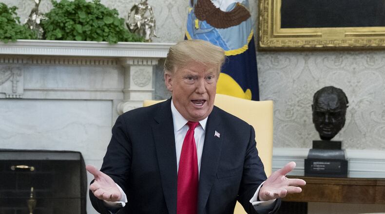 U.S. President Donald J. Trump delivers remarks to members of the news media during a meeting with Prime Minister of Israel Benjamin Netanyahu (unseen) in the Oval Office of the White House March 25, 2019 in Washington, DC. Trump signed an order recognizing Golan Heights as Israeli territory.Netanyahu is cutting short his visit to Washington due to a rocket attack in central Israel that had injured seven people. (Photo by Michael Reynolds - Pool/Getty Images)