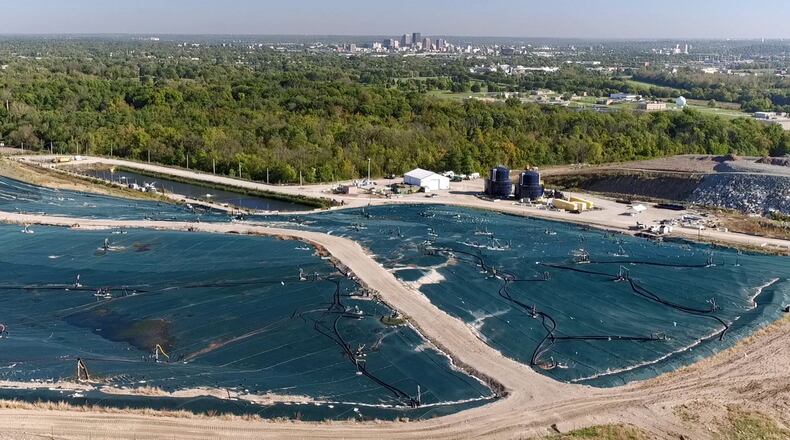More than 2,000 people are seeking payment from a Dayton landfill in a class-action lawsuit settlement stemming from emitted odors that have led to complaints from several area cities, records show. A large membrane with gas collectors covers parts of the Stony Hollow Landfill. TY GREENLEES / STAFF