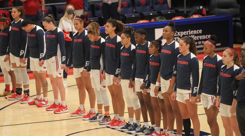 Dayton stands for the national anthem before a game against Toledo on Wednesday, Nov. 17, 2021, at UD Arena. David Jablonski/Staff