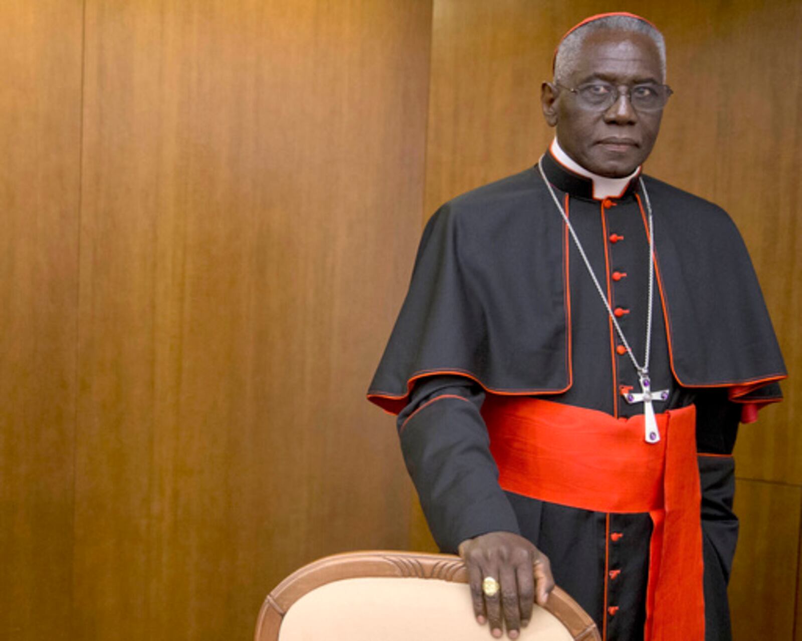 FILE - Cardinal Robert Sarah, prefect of the Congregation for Divine Worship and the Discipline of the Sacraments, arrives for the presentation of Cardinal Raymond Leo Burke's book Divine Love Made Flesh, in Rome, Wednesday, Oct. 14, 2015. (AP Photo/Andrew Medichini, File)