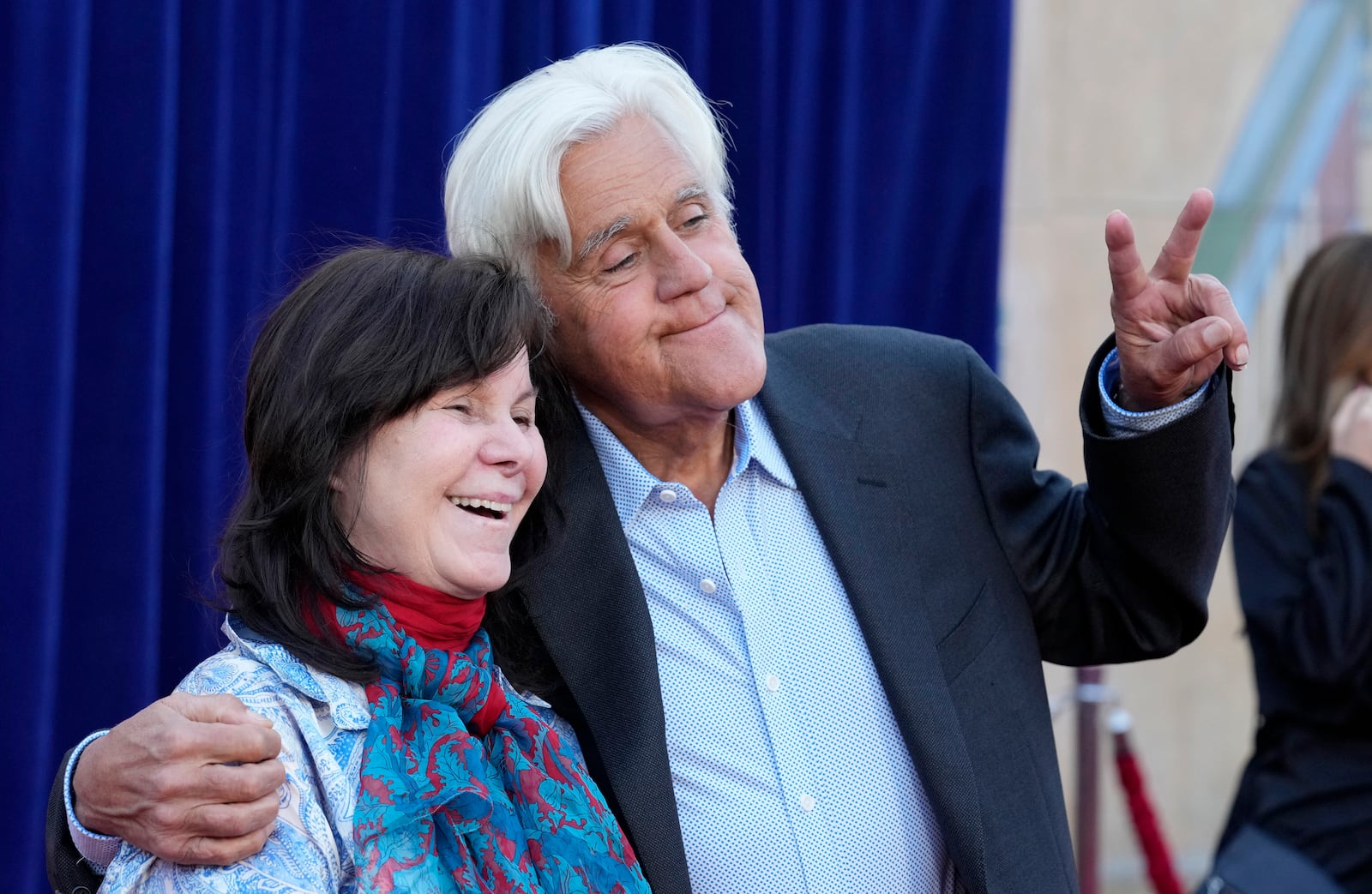 Jay Leno and his wife Mavis pose together at the premiere of the Netflix film "Unfrosted" at the Egyptian Theatre, Tuesday, April 30, 2024, in Los Angeles. (AP Photo/Chris Pizzello)
