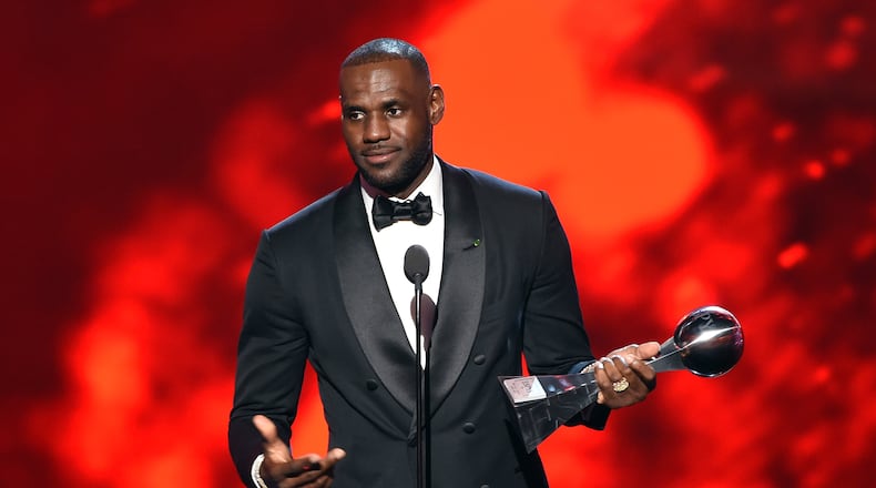 LOS ANGELES, CA - JULY 13: NBA player LeBron James accepts the Best Male Athlete award onstage during the 2016 ESPYS at Microsoft Theater on July 13, 2016 in Los Angeles, California. (Photo by Kevin Winter/Getty Images)