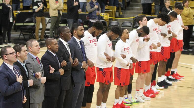 Dayton stands for the national anthem before a game against Colorado in the first round of the NIT on Tuesday, March 19, 2019, at the CU Events Center in Boulder, Colo. David Jablonski/Staff