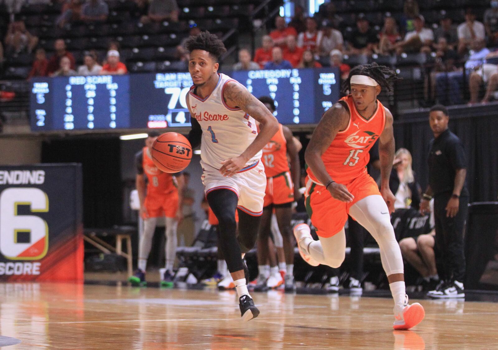 Darrell Davis, of Red Scare, dribbles against Category 5 in the second round of The Basketball Tournament on Sunday, July 25, 2021, at the Covelli Center in Columbus. David Jablonski/Staff