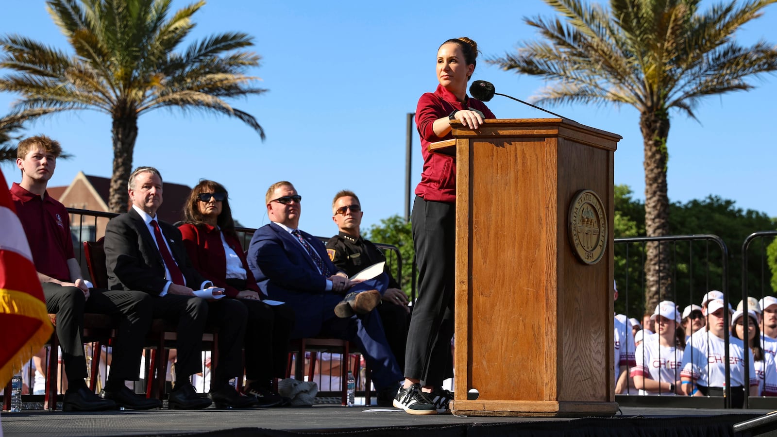 The day after an active shooter on campus Florida State Dr. Amy Hecht vice president of student affairs addresses a vigil on campus at Langford Green, Tallahassee, Fla., Friday, April 18, 2025. (AP Photo/Gary McCullough)