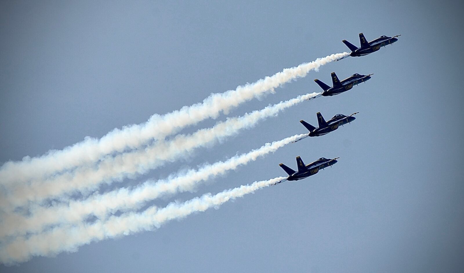 The Navy's Blue Angels perform Saturday, July 30, 2022, at the Dayton Air Show. MARSHALL GORBY \STAFF