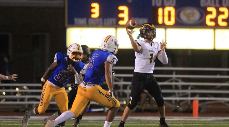 Centerville's Chase Harrison throws a pass against Gahanna Lincoln on Friday. Sept. 3, 2021, in Gahanna. David Jablonski/Staff