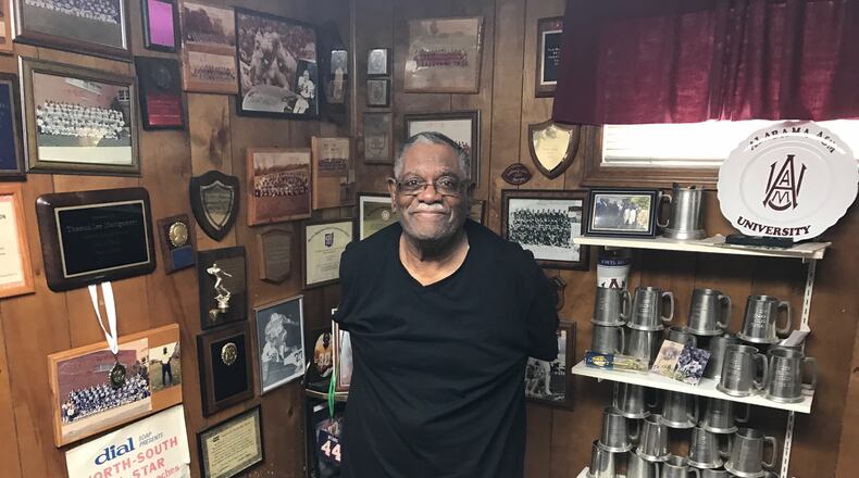 Tom Montgomery today, at 81, in the museum like collection of mementos he has in basement of his Trotwood home. Tom Archdeacon/CONTRIBUTED