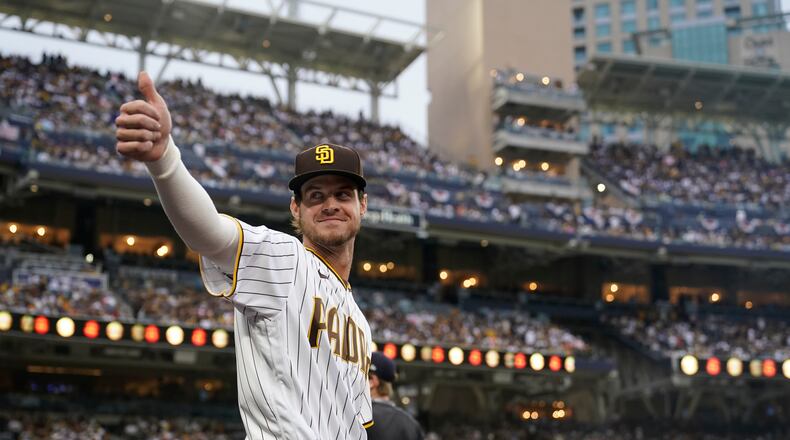 San Diego Padres first baseman Wil Myers reacts to fans before Game 3 of a baseball NL Division Series against the Los Angeles Dodgers, Friday, Oct. 14, 2022, in San Diego. (AP Photo/Ashley Landis)