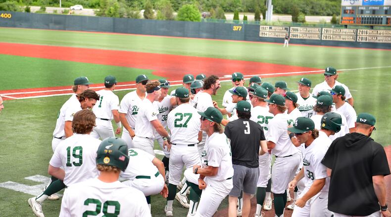 Wright State's Andrew Patrick and his teammates celebrate Patrick's grand slam during Saturday's Horizon League Championship game at Nischwitz Stadium. Wright State Athletics photo