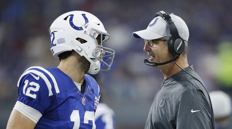 INDIANAPOLIS, IN - AUGUST 25: Head coach Frank Reich of the Indianapolis Colts talks with Andrew Luck #12 in the first quarter of a preseason game against the San Francisco 49ers at Lucas Oil Stadium on August 25, 2018 in Indianapolis, Indiana. (Photo by Joe Robbins/Getty Images)