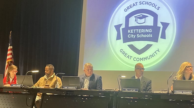 The Kettering City Schools board of education is challenging the values of several commercial properties. Board President Toby Henderson (center) says it's an effort to make sure values are correct, so everyone is "paying their fair share" in property taxes, which help fund the schools. NICK BLIZZARD/STAFF