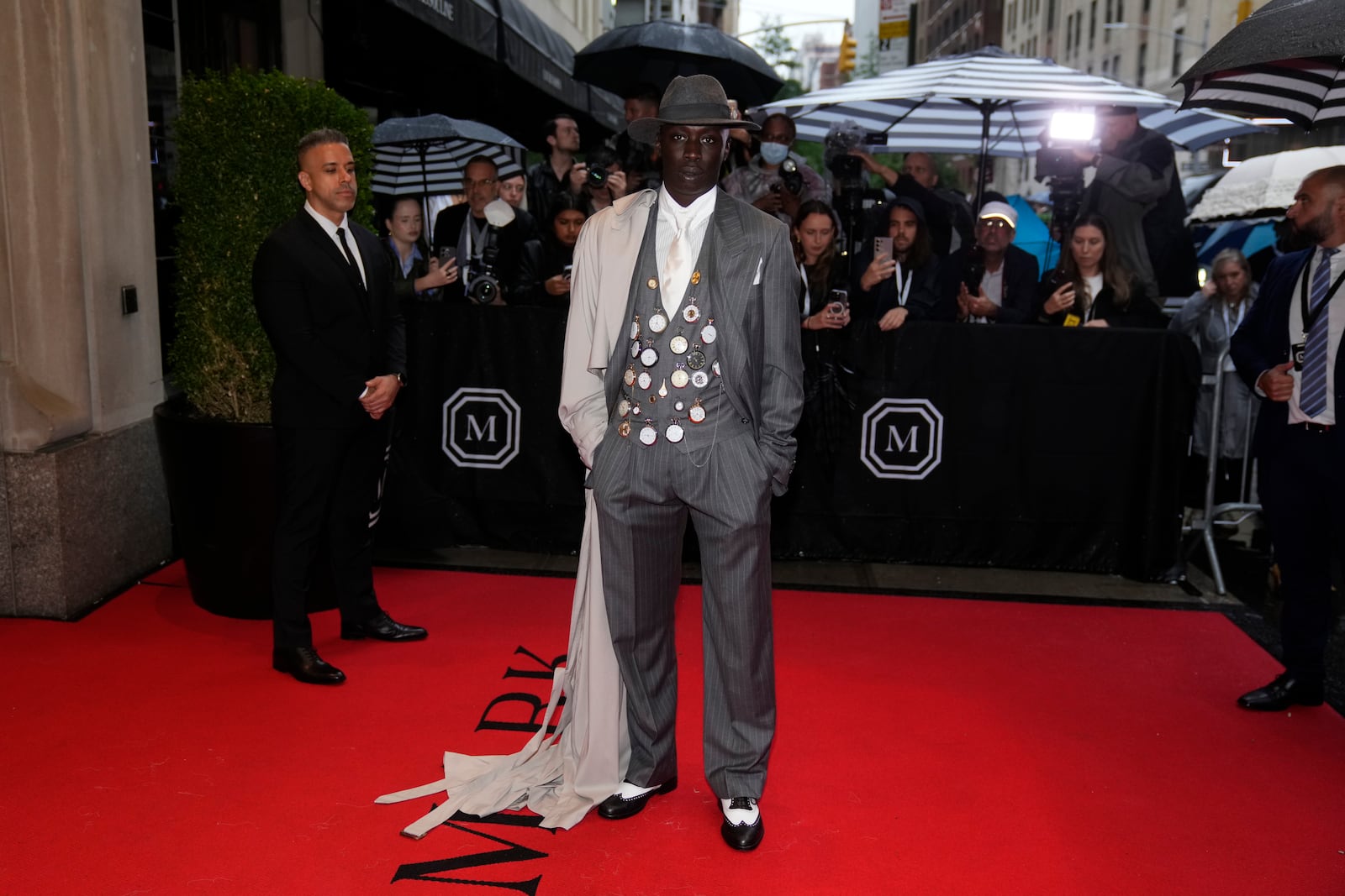 FILE - Khaby Lame departs The Mark Hotel prior to attending The Metropolitan Museum of Art's Costume Institute benefit gala celebrating the opening of "Superfine: Tailoring Black Style" in New York, May 5, 2025. (Photo by Charles Sykes/Invision/AP File)