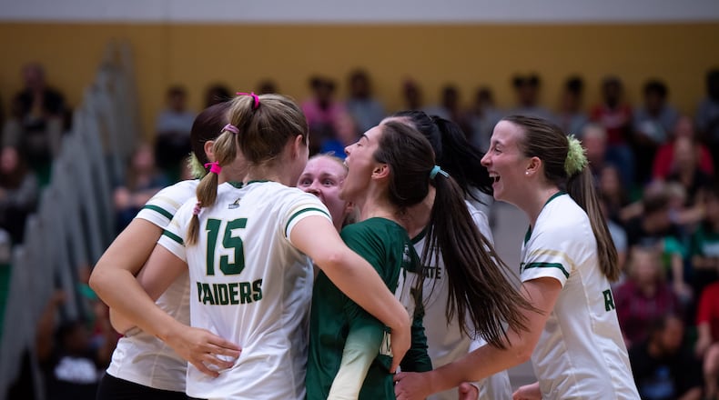 Members of the Wright State volleyball team celebrate a point in a match vs. IUPUI on Oct. 13, 2023. Wright State Athletics photo