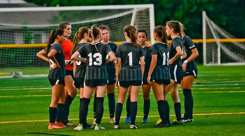 The Centerville girls soccer team won its 24th district title with a 2-1 win over Oak Hills. The Elks will play Mason on Tuesday in a Division I regional semifinal. Oakwood (Division II) and Waynesville (Division III) also are playing in the regional semis. CONTRIBUTED