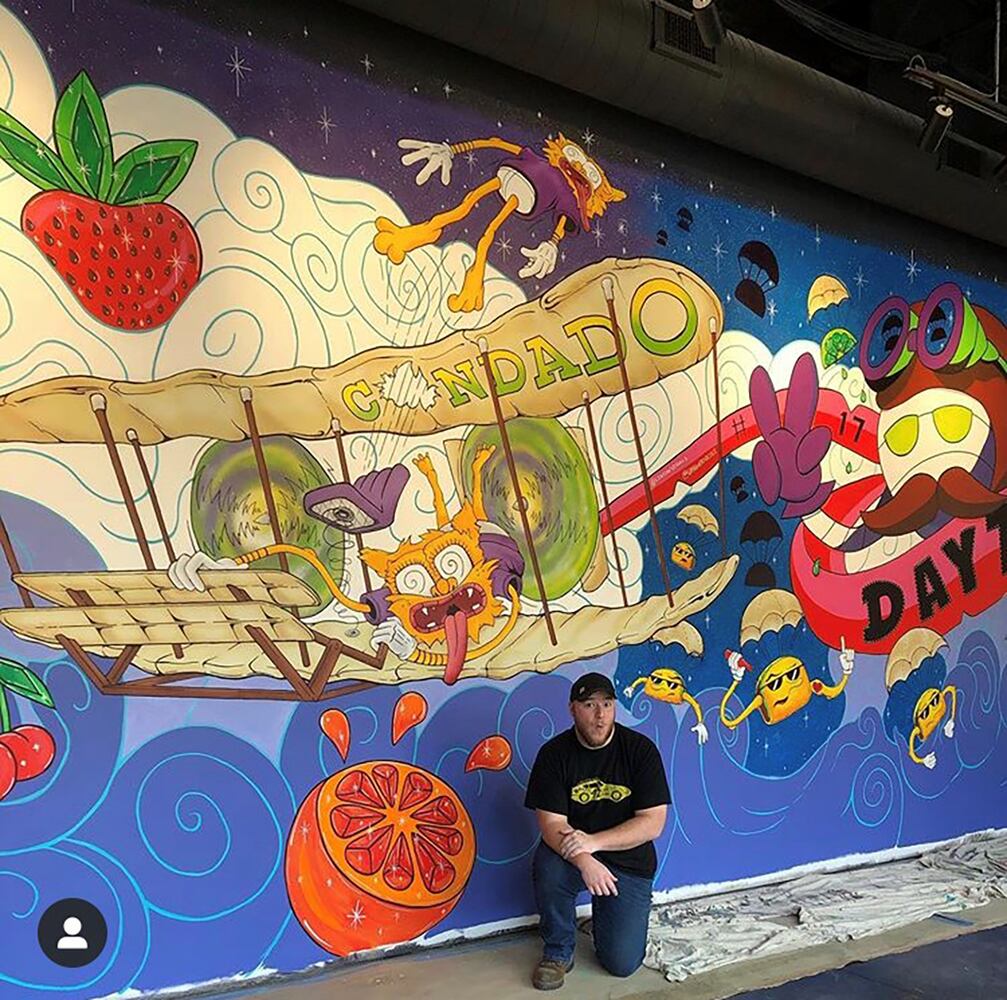 PHOTOS: Wild and wacky murals take over new restaurant at The Greene