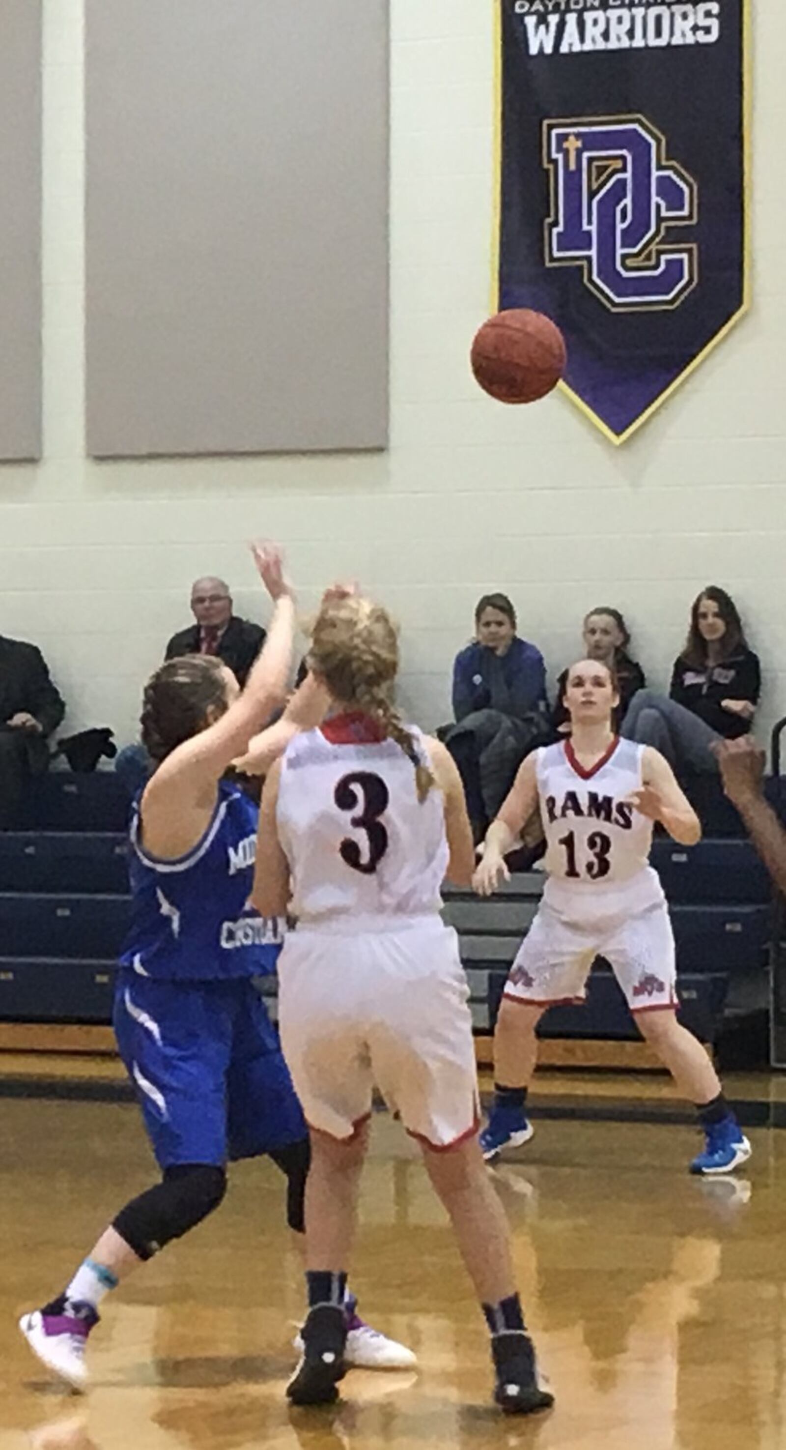 Miami Valley’s Grace Zerba (3) delivers a pass toward teammate Eva Lyon (13) as Middletown Christian’s Ari Pagnard (12) defends Thursday night at Lane Gymnasium in Washington Township. RICK CASSANO/STAFF