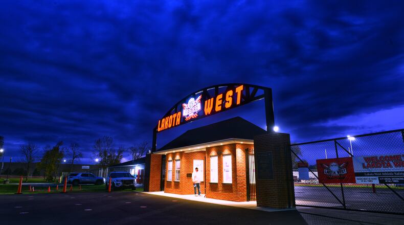 The Lakota West-Colerain playoff football game was postponed Friday night and rescheduled for 10 a.m. Saturday due to thunderstorms that rolled through Southwest Ohio. Nick Graham/STAFF