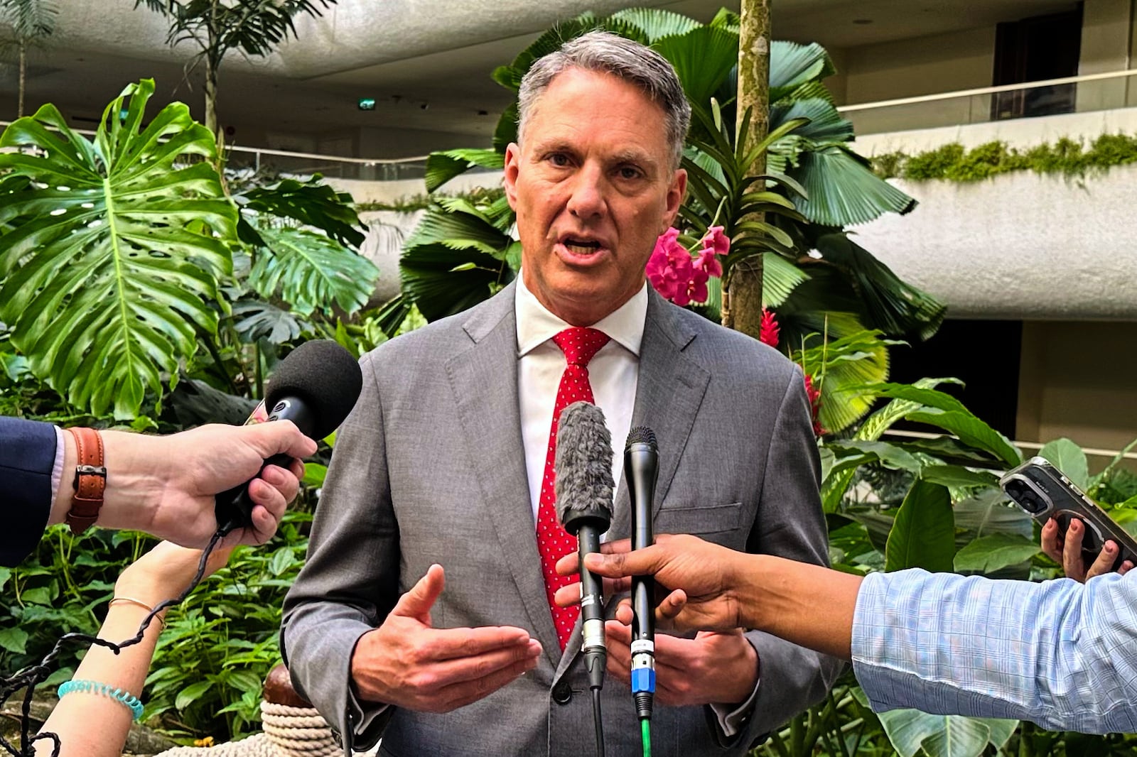 Australia's Defense Minister and Deputy Prime Minister Richard Marles talks to the media during an interview in the 22nd Shangri-La Dialogue summit in Singapore, Sunday, June 1, 2025. (AP Photo/Joeal Calupitan)