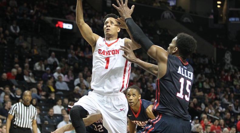 Dayton’s Darrell Davis shoots against Richmond’s Terry Allen in the quarterfinals of the Atlantic 10 tournament on Friday, March 11, 2016, at the Barclays Center in Brooklyn, N.Y. David Jablonski/Staff