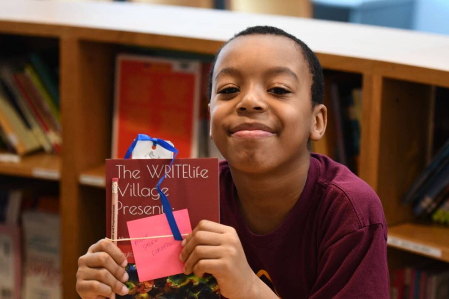 Photos: Dayton Strong! Kids receive copies of book they wrote about tornadoes