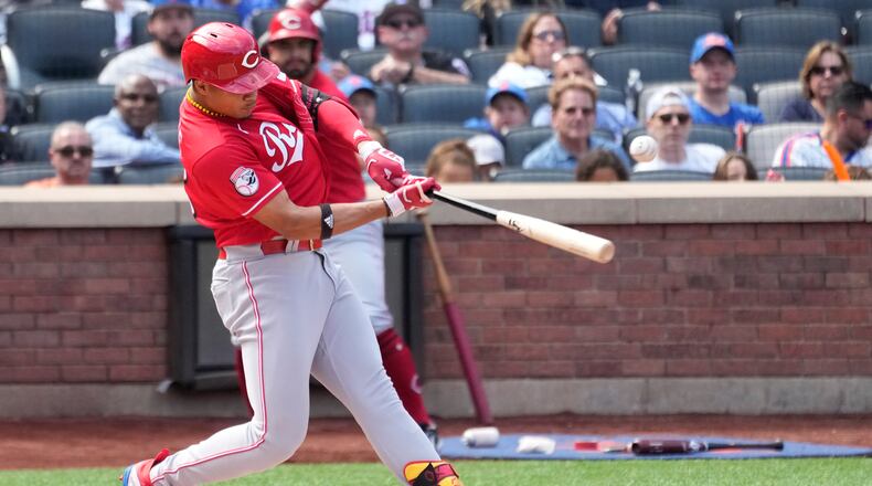 Cincinnati Reds' Noelvi Marte hits an RBI single during the first inning of a baseball game against the New York Mets, Sunday, Sept. 17, 2023, in New York. (AP Photo/Mary Altaffer)