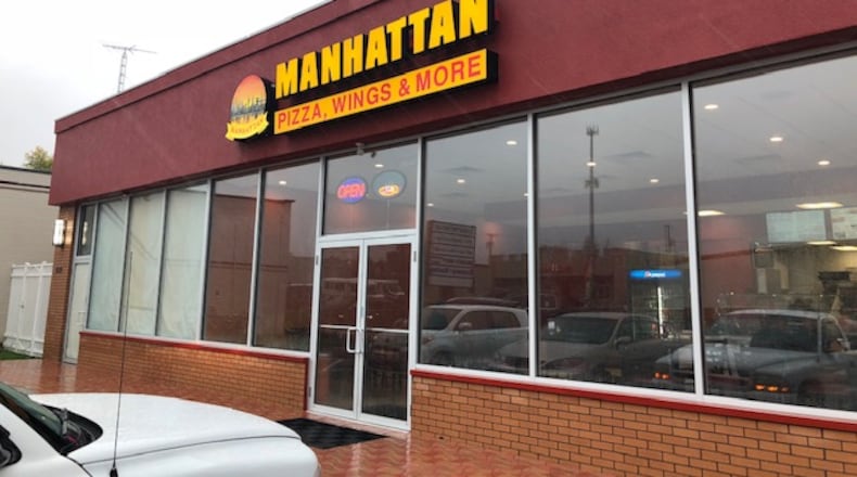 A new pizza restaurant, Manhattan Pizza, Wings & More opened at 4980 Nebraska Ave., east of Brandt Pike (Ohio 201) on Thursday, Nov. 1 in Huber Heights. MARK FISHER / STAFF PHOTO