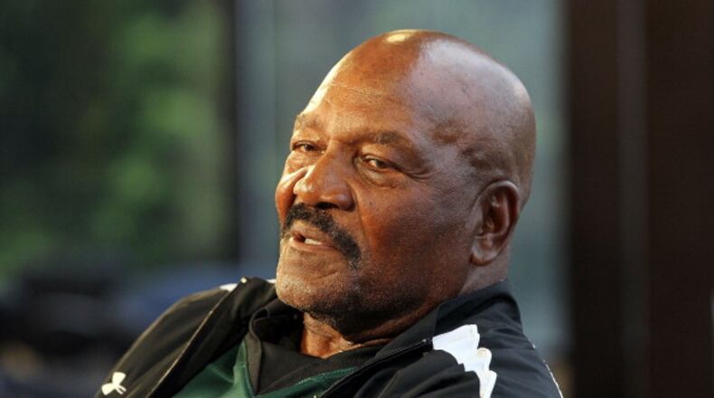 UNIONDALE, NY - JUNE 01: Football legend and new co-owner of the Long Island Lizards Jim Brown conducts an interview before the Major League Lacrosse game against the Ohio Machine on June 1, 2012 at Shuart Stadium in Uniondale, New York. (Photo by Jim McIsaac/Getty Images)