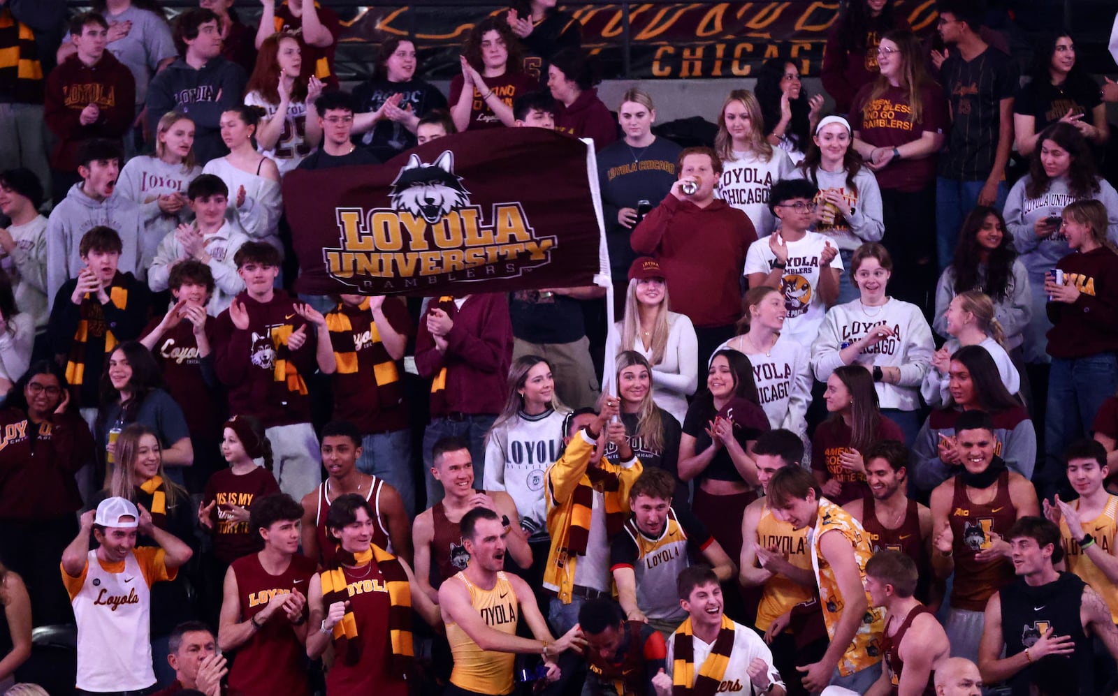 Fans in the Loyola Chicago student section cheer during a game against Dayton on Friday, Feb. 21, 2025, at Gentile Arena in Chicago. David Jablonski/Staff