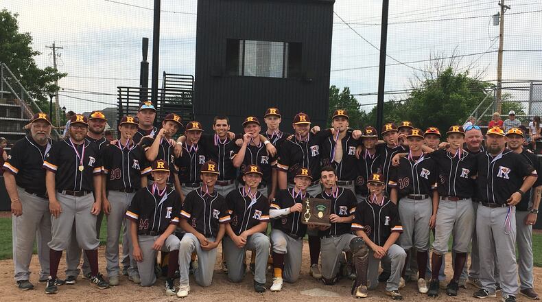 The Ross Rams pose with their hardware Monday at Mason after beating Tippecanoe 6-3 to repeat as Division II district champions. RICK CASSANO/STAFF